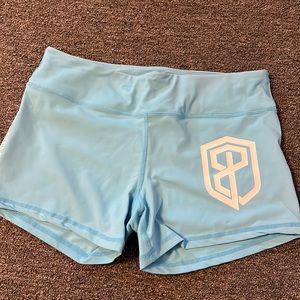 Born primitive light blue shorts